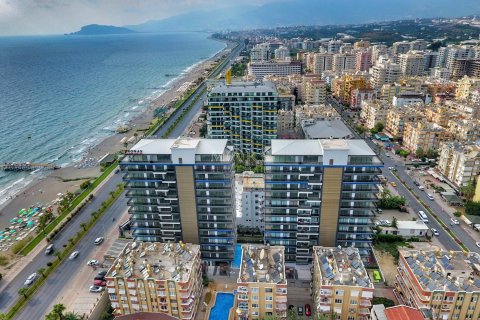 2+1 Lejlighed i A new luxury residential complex with all amenities on the first line of the sea in the resort town of Mahmutlar, right on the beach., Alanya, Antalya, Tyrkiet Nr. 53725 - 27