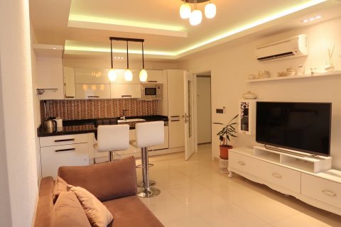 آپارتمان در  Mahmutlar ، امارات متحده عربی 1 خوابه ، 65 متر مربع.  شماره 79832 - 1