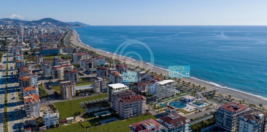 Жилой комплекс NOVIS BEACH RESİDENCE &#8212; архитектурный проект на первой линии моря  в Аланье, Анталья, Турция №56040